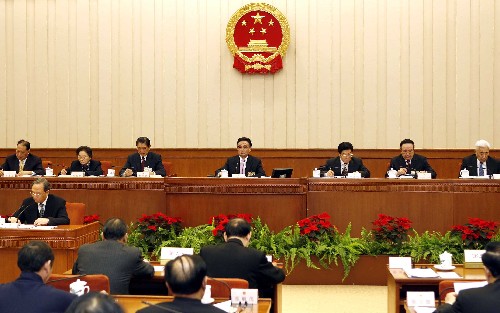 人大会议听取两报告4法律草案提请表决