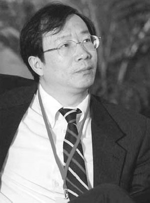 央行行长助理易纲下基层 职务变动引猜测