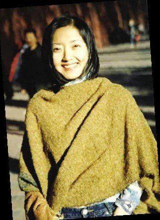 柴静懒理"小三"风波 素颜离北京坐经济舱