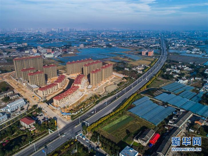 (庆祝改革开放40周年基层行·乡镇篇·图文互动)(2)“中国第一座农民城”温州龙港正向现代化新生城市跨越