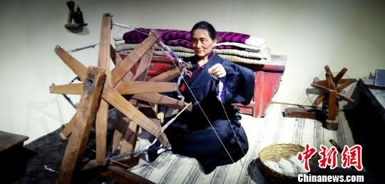 图为乡村纺织服饰馆陈设。 马爱彬 摄 图为乡村纺织服饰馆陈设。 马爱彬 摄