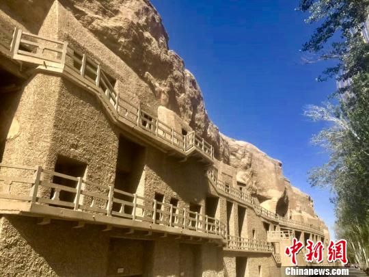图为世界文化遗产莫高窟。 张婧 摄 图为世界文化遗产莫高窟。 张婧 摄