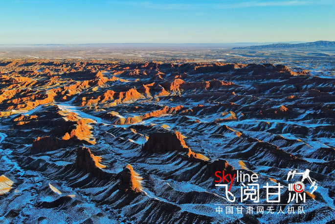 【飞阅甘肃】平山湖大峡谷：雪映丹霞愈妖娆