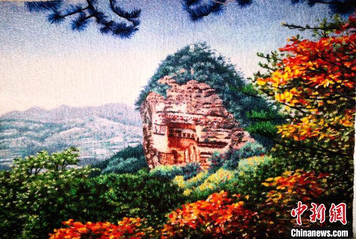 图为刘云帆刺绣作品——麦积山石窟。(资料图) 甘肃省非遗保护中心供图