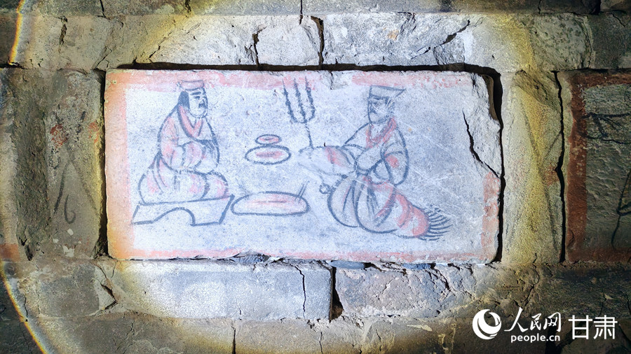 《烤肉图》壁画砖。（主办方供图）